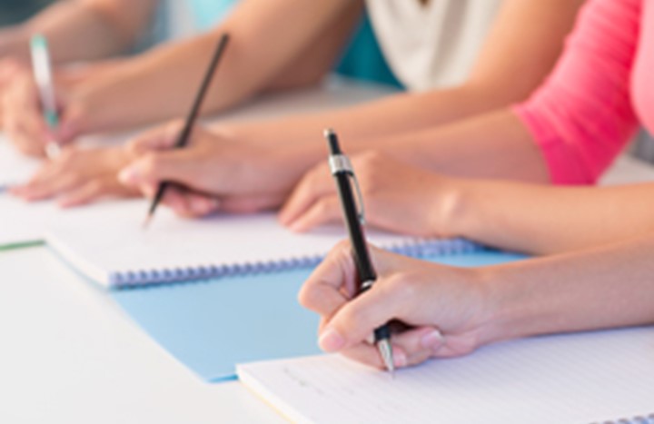 Students writing image